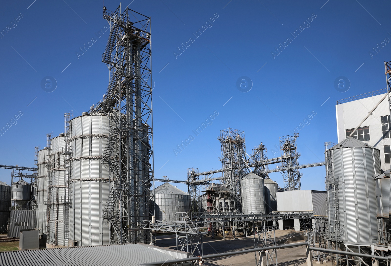 Photo of View of modern granaries for storing cereal grains outdoors