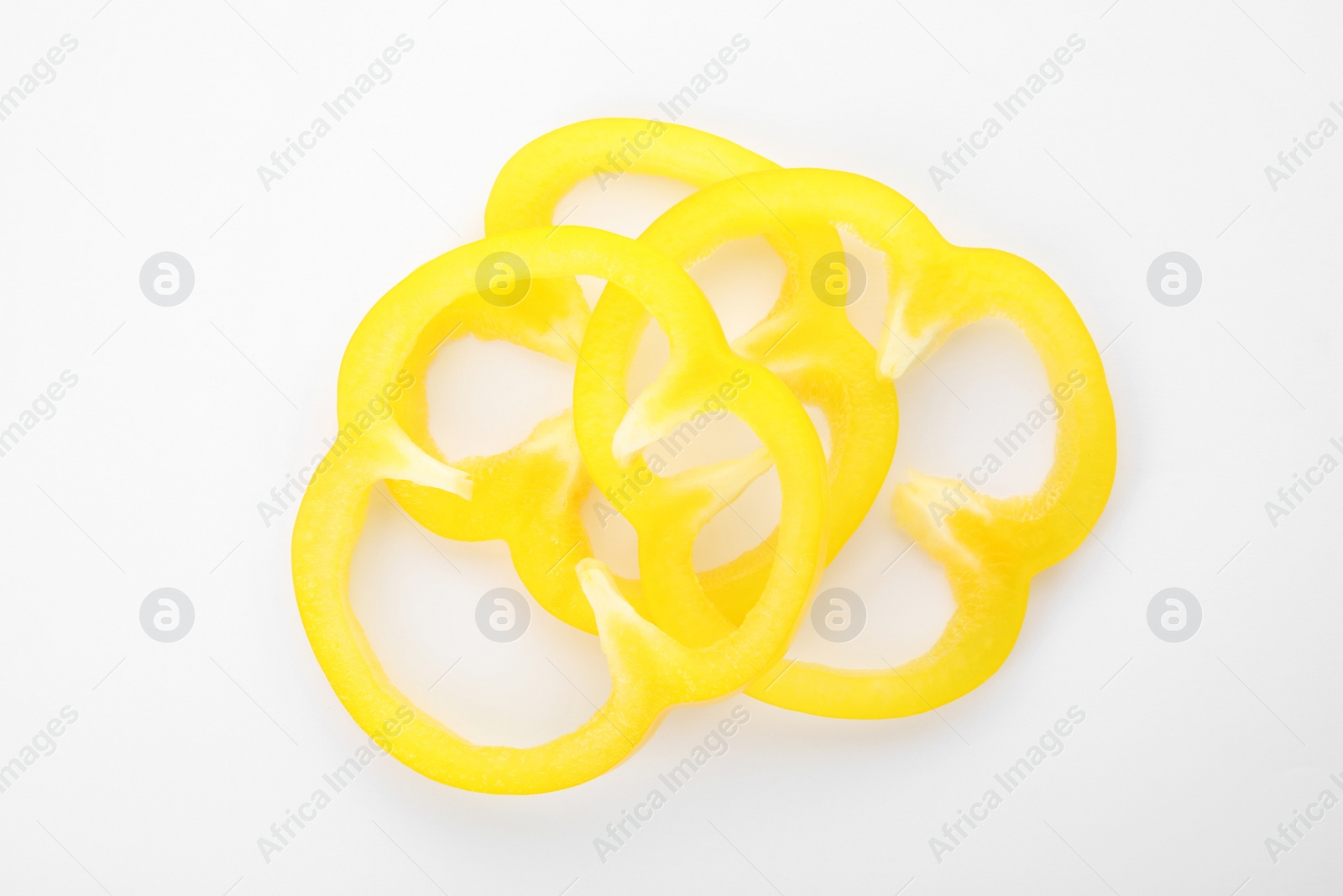 Photo of Cut ripe paprika pepper on white background, top view