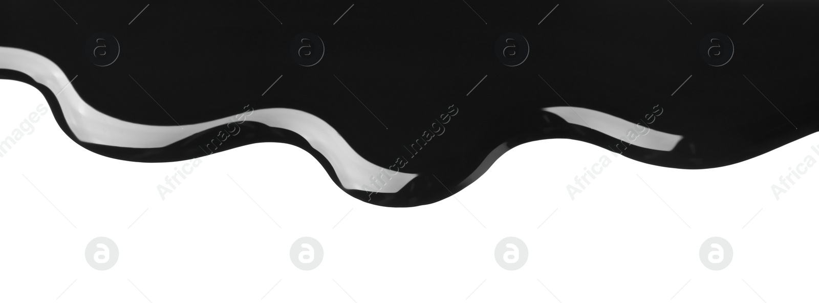 Photo of Black glossy paint spilled on white background, top view