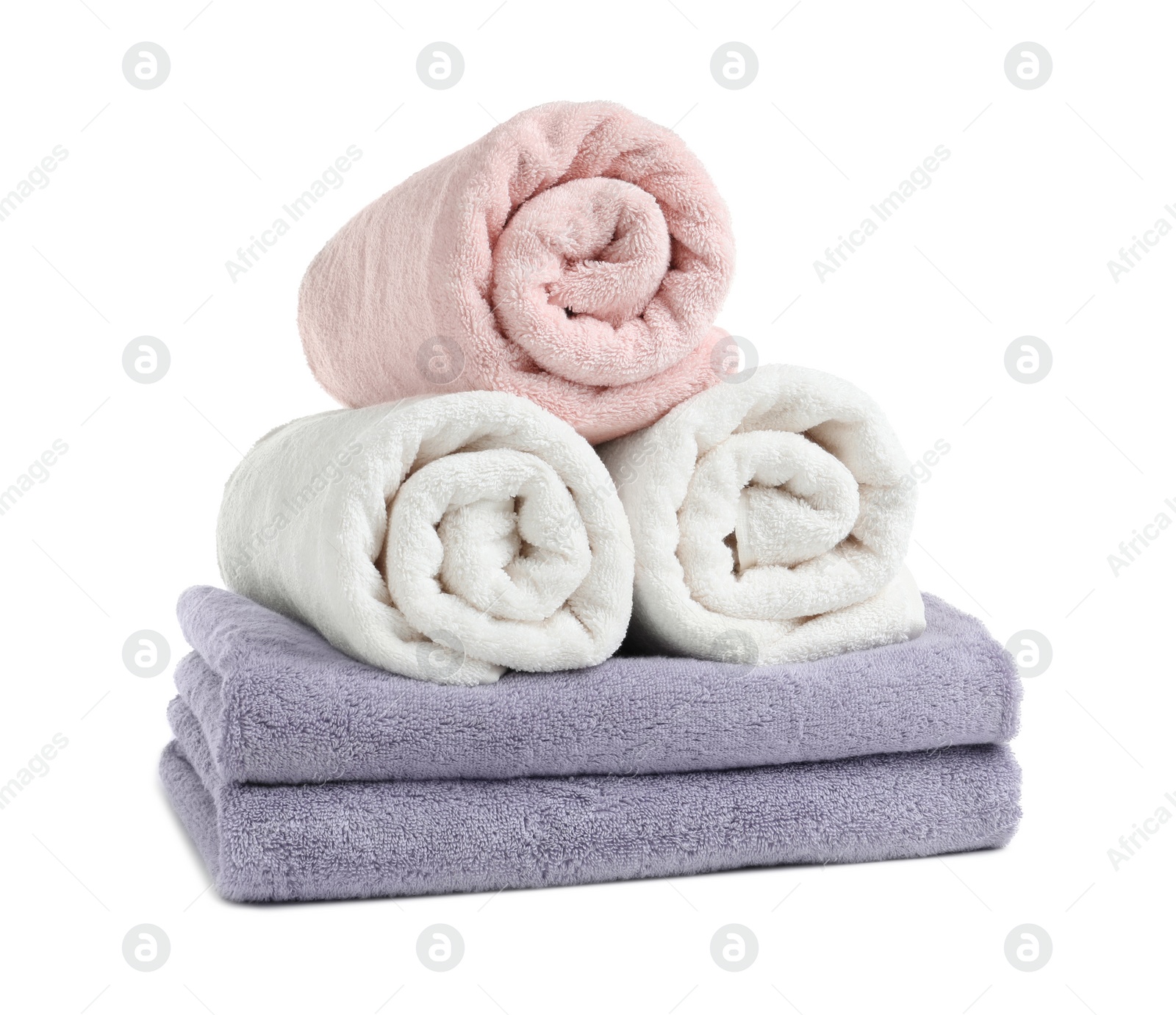 Photo of Clean soft terry towels on white background