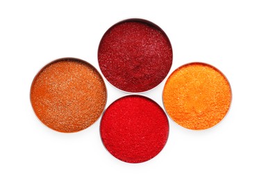 Many different food coloring on white background, top view