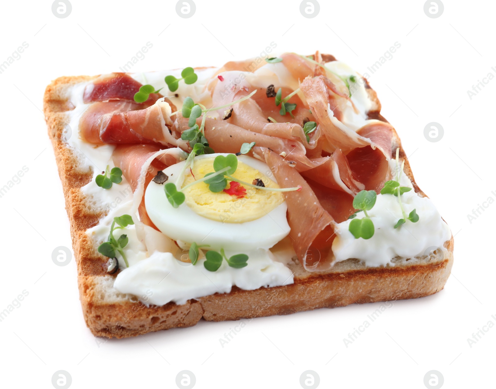Photo of Delicious sandwich with prosciutto, egg, cream cheese and microgreens isolated on white