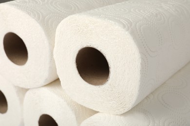 Photo of Rolls of paper towels as background, closeup view