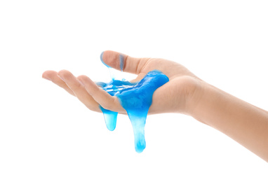 Photo of Woman playing with blue slime isolated on white, closeup. Antistress toy