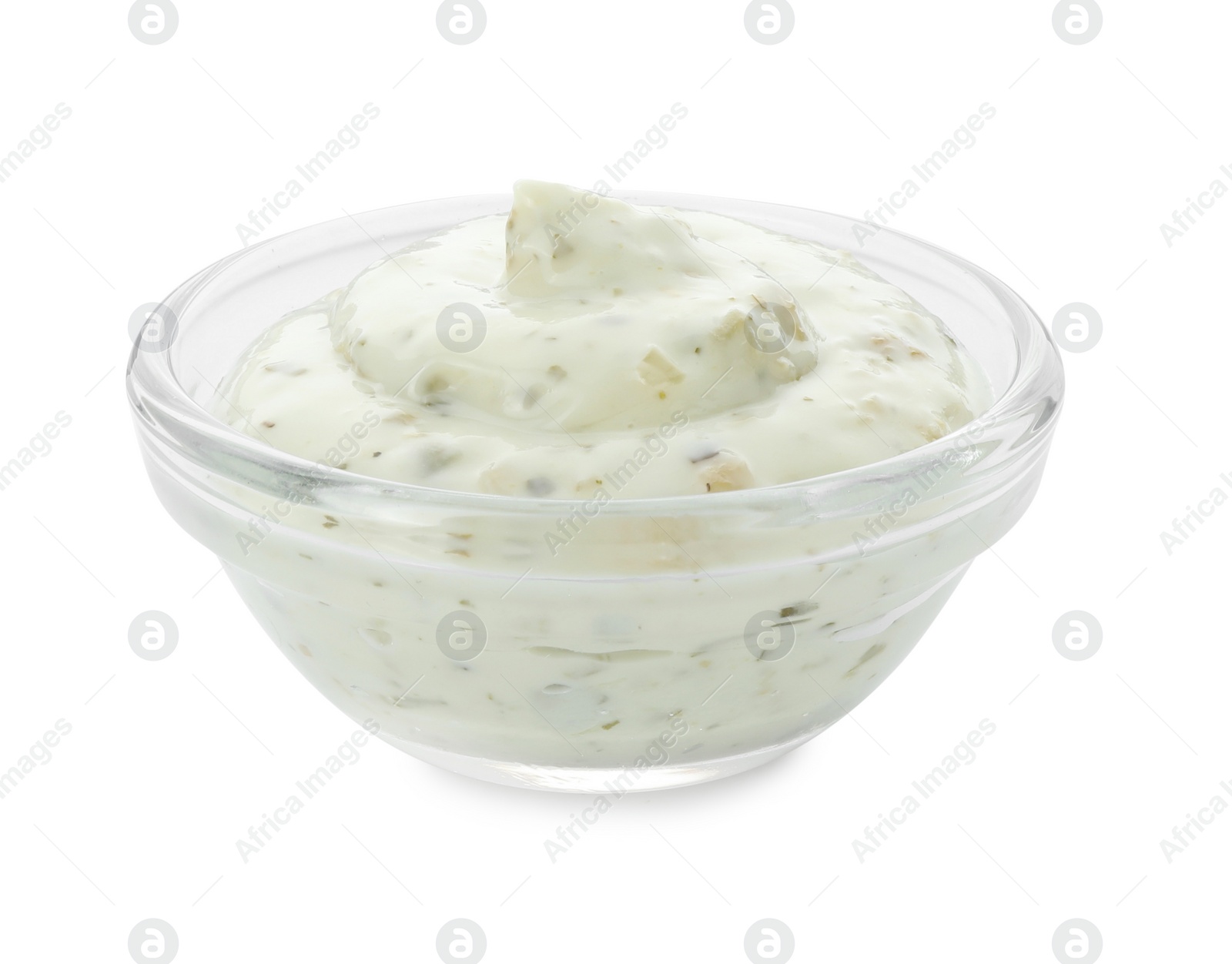 Photo of Tasty tartar sauce in bowl isolated on white