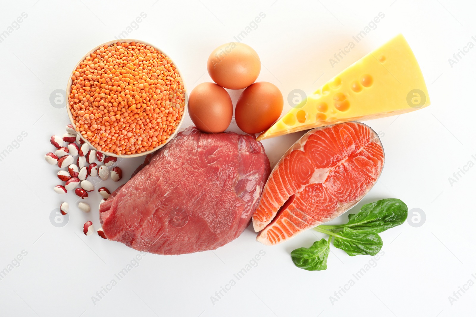 Photo of Set of natural food high in protein on white background, top view