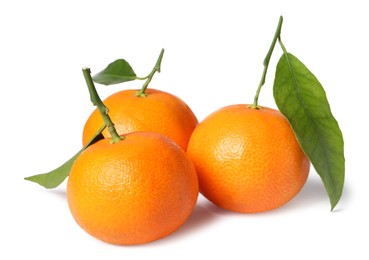 Fresh ripe juicy tangerines with green leaves isolated on white