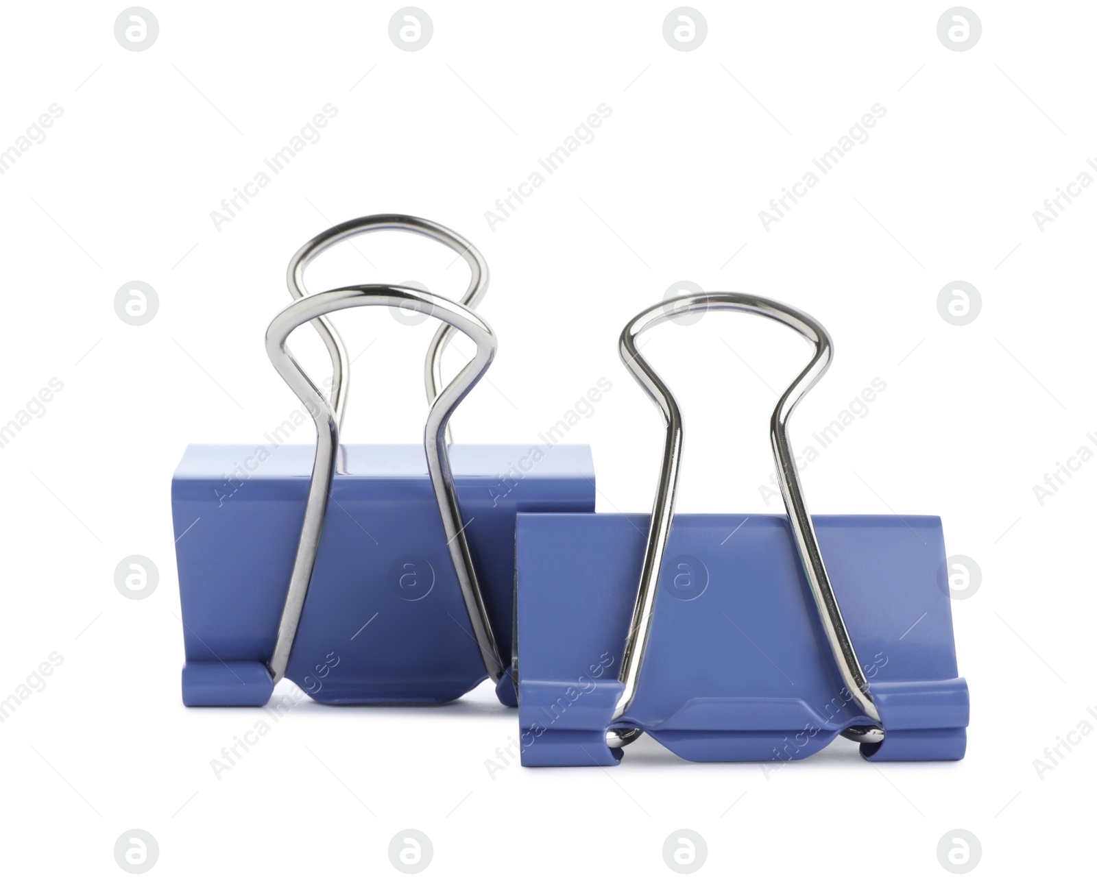 Photo of Blue binder clips on white background. Stationery item