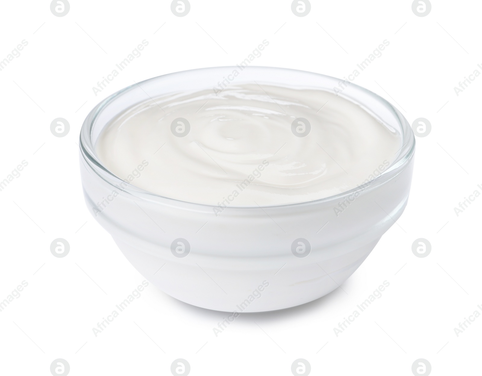 Photo of Bowl with delicious organic yogurt isolated on white