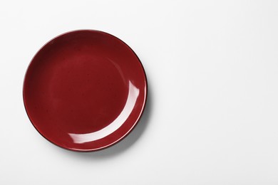 Photo of Clean plate on light grey background, top view. Space for text