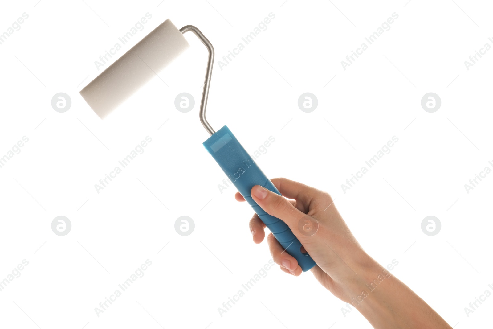 Photo of Woman holding paint roller brush on white background, closeup