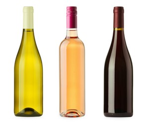 Bottles of white, rose and red wine isolated on white