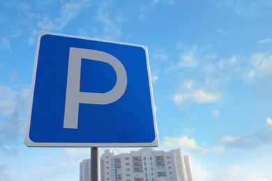 Photo of Traffic sign PARKING outdoors. Space for text