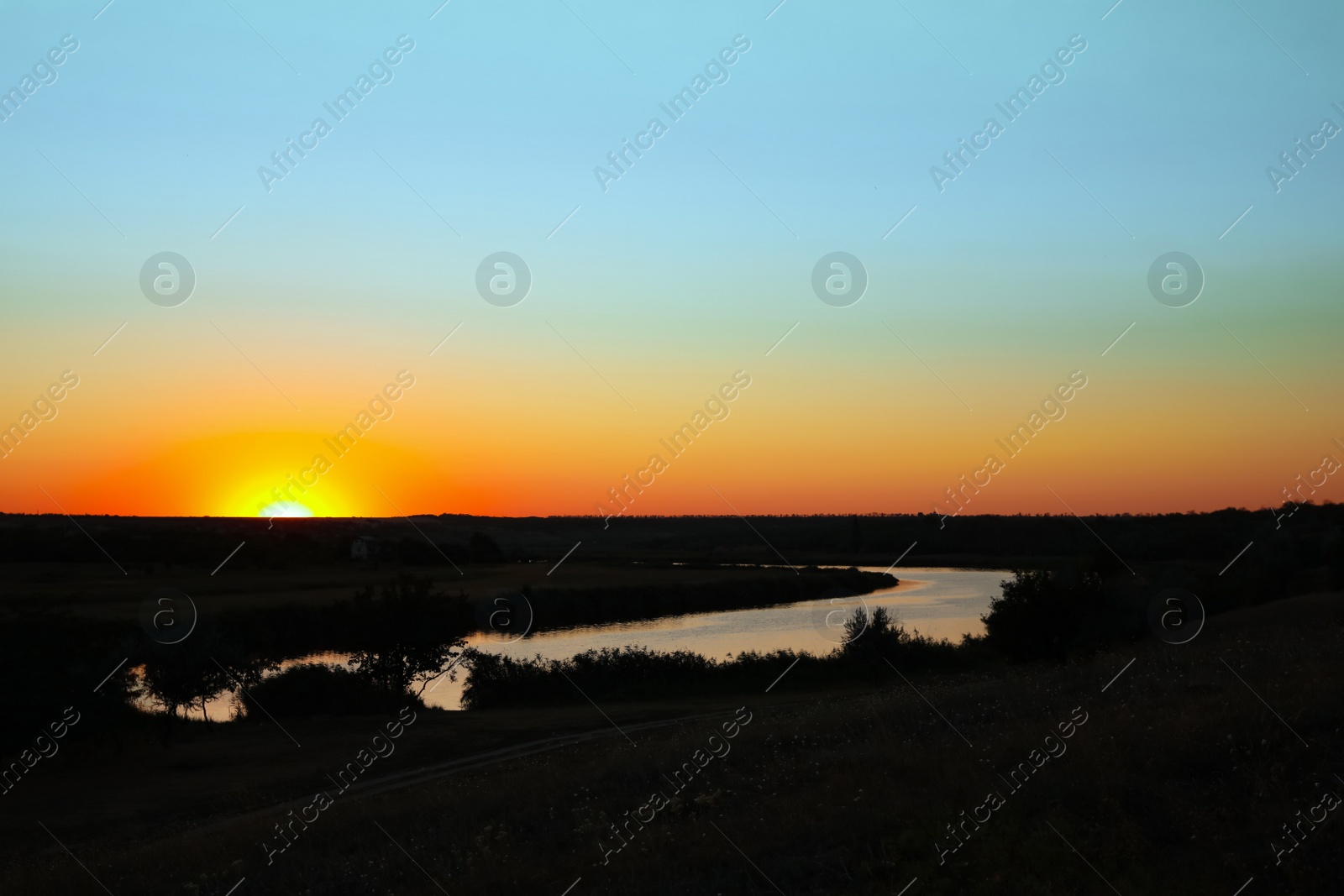 Photo of Picturesque view of beautiful river at sunset