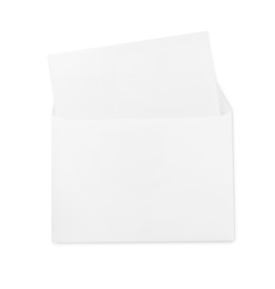 Photo of Envelope with blank letter on white background, top view