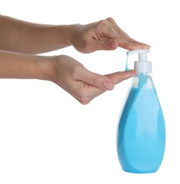 Photo of Woman using liquid soap dispenser on white background, closeup