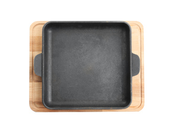 Baking dish and wooden board isolated on white, top view. Cooking utensils