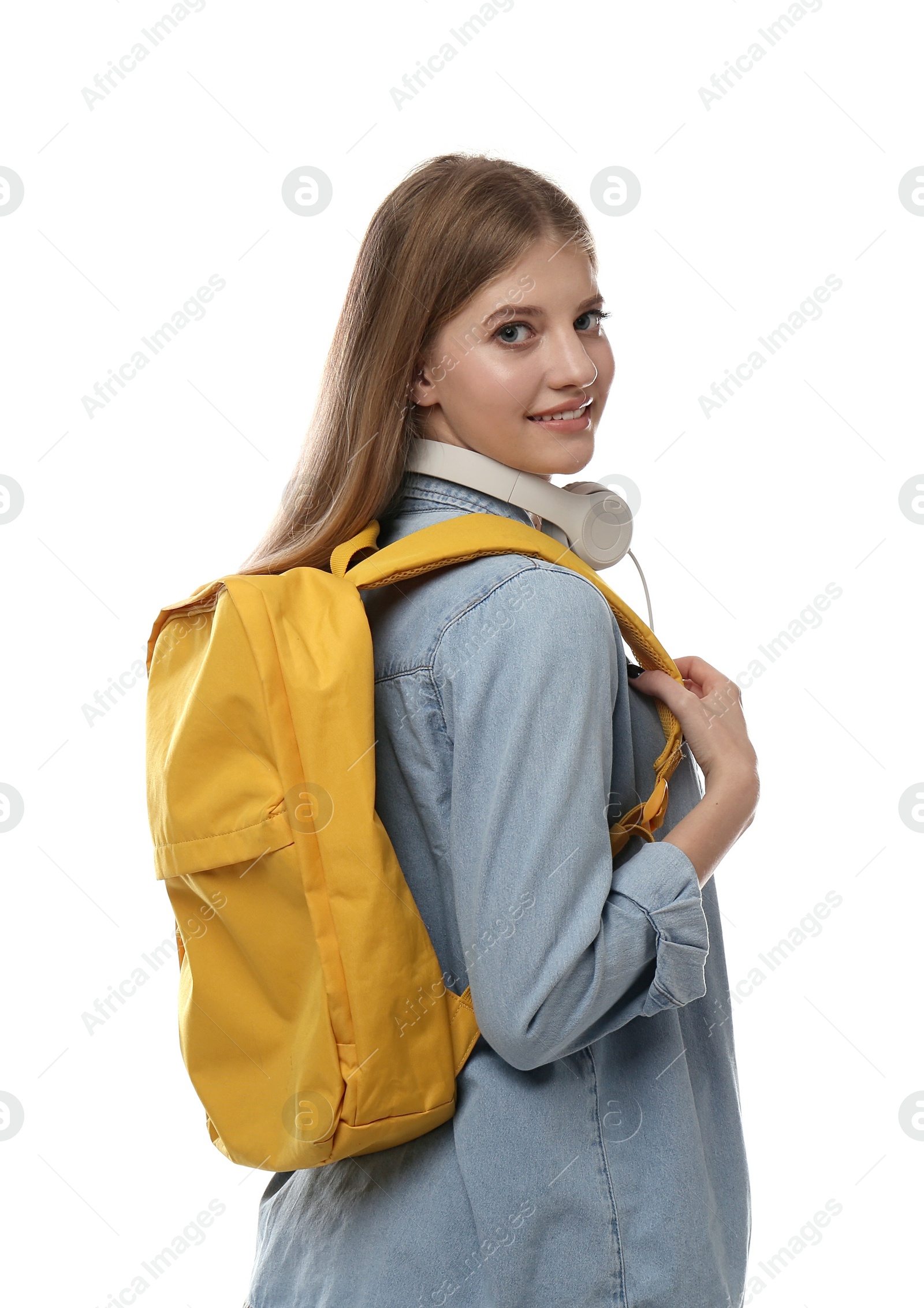 Photo of Teenage student with backpack and headphones on white background