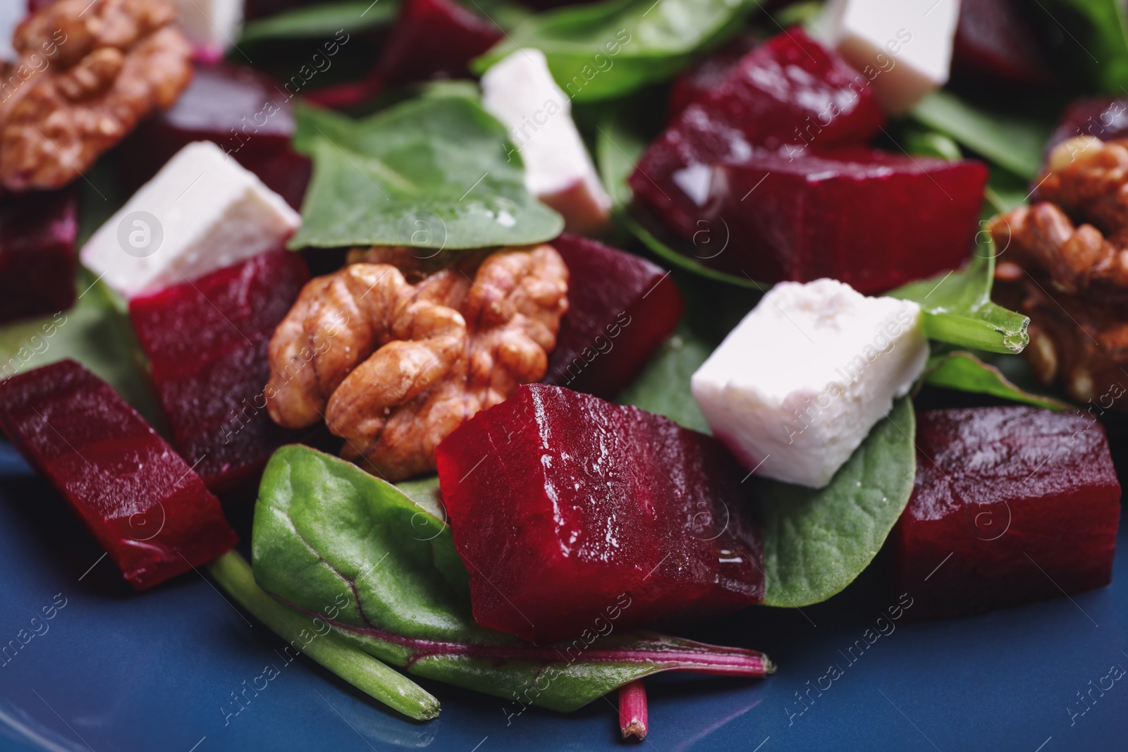 Photo of Fresh delicious beet salad on plate, closeup