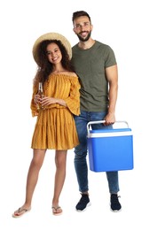 Photo of Happy couple with cool box and bottle of beer on white background