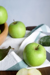 Photo of Fresh ripe green apples on wooden table