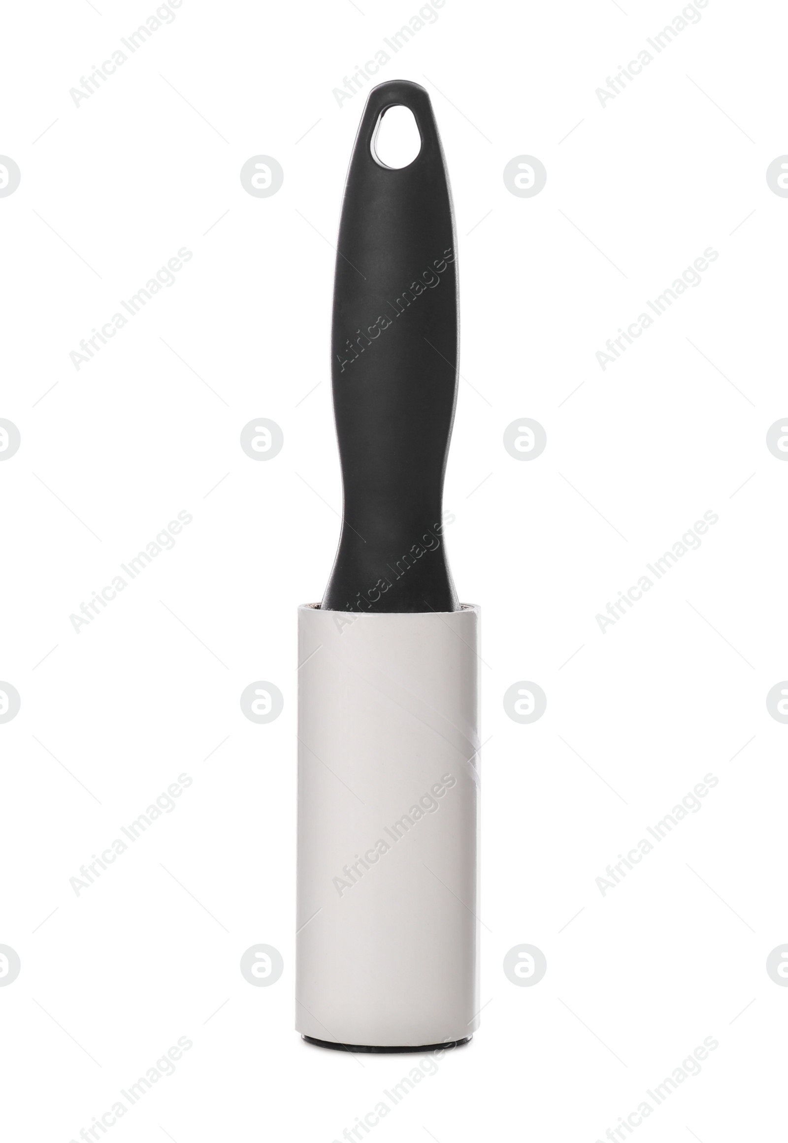 Photo of New lint roller with black handle isolated on white