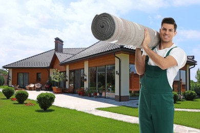 Image of Worker with rolled carpet outdoors on sunny day