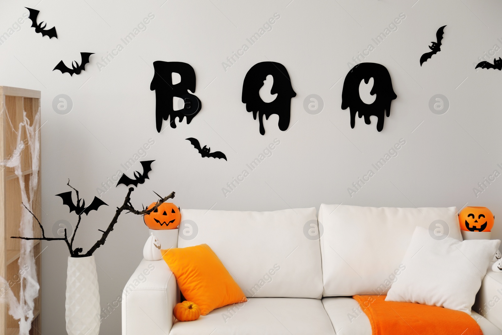 Photo of Stylish room interior with creative Halloween decor