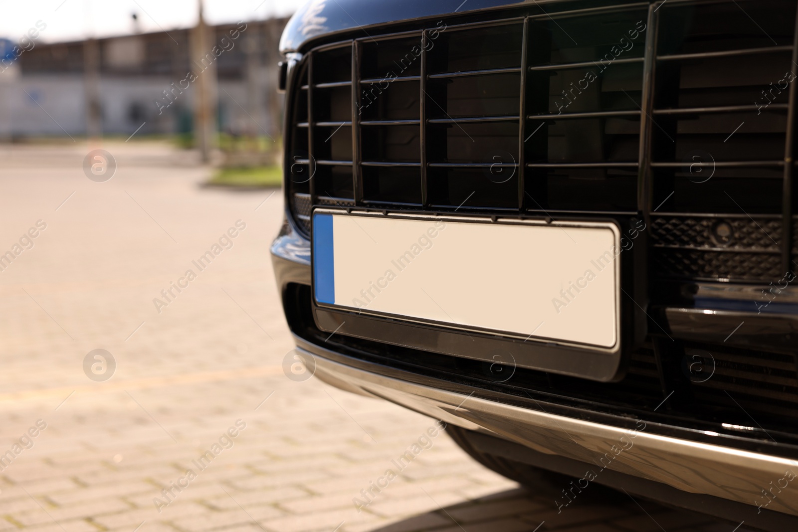 Photo of Car with vehicle registration plate outdoors, closeup