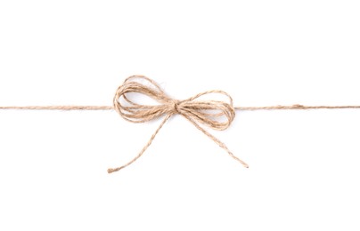 Linen rope string with bow isolated on white, top view