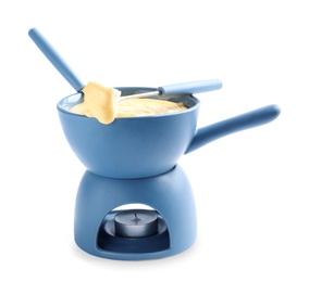 Pot of delicious cheese fondue and fork with bread on white background