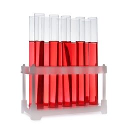 Photo of Test tubes with red liquid on white background. Laboratory glassware