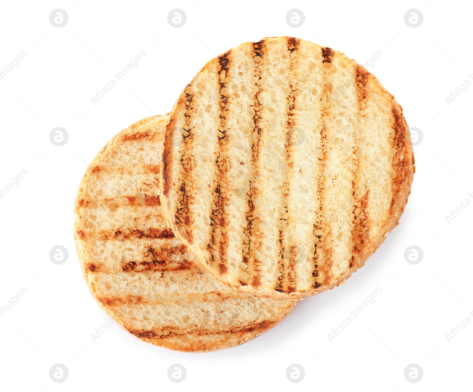 Photo of Halves of grilled burger bun isolated on white, top view