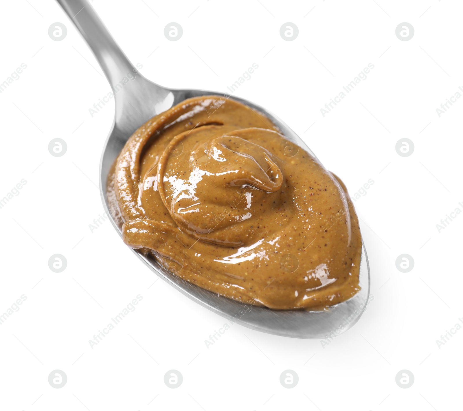 Photo of Delicious nut butter in spoon isolated on white