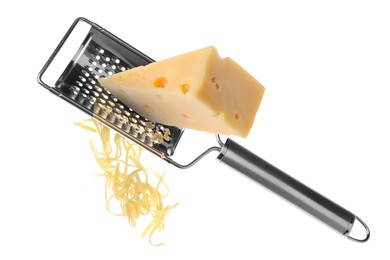 Image of Grating cheese with hand grater in air on white background