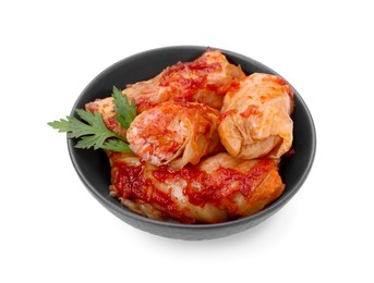 Photo of Delicious stuffed cabbage rolls cooked with tomato sauce in bowl isolated on white