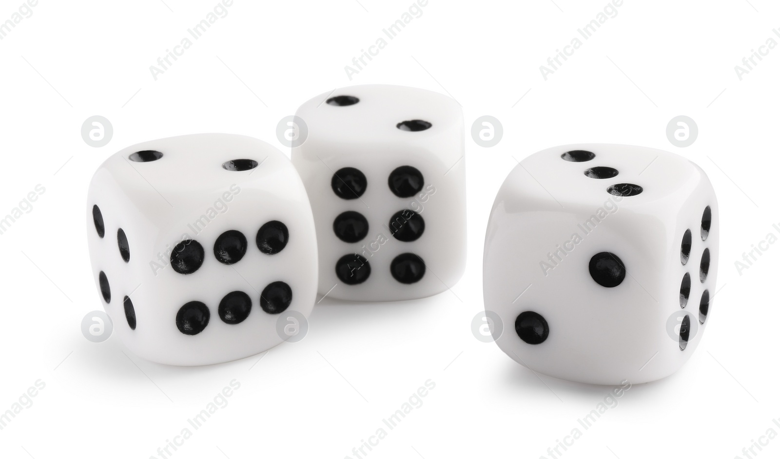 Photo of Three dices isolated on white. Game cubes