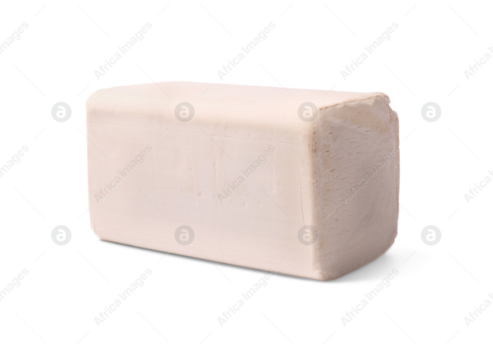 Photo of Block of compressed yeast isolated on white