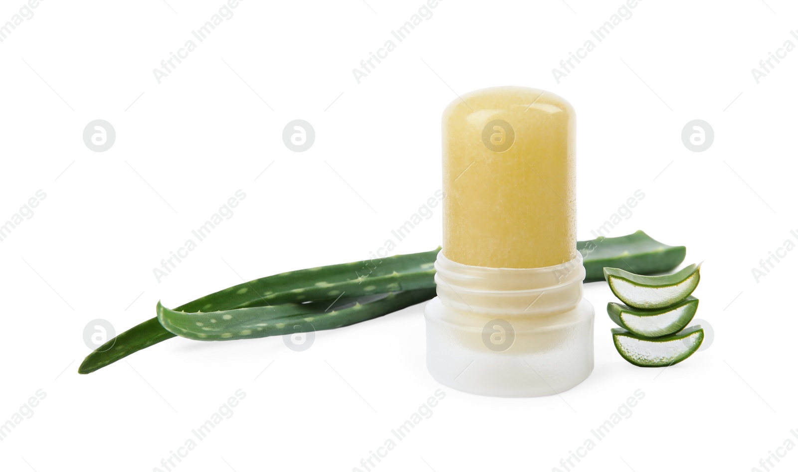 Photo of Natural crystal alum deodorant and fresh aloe on white background