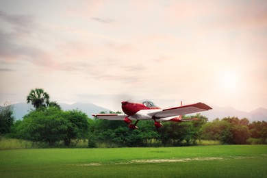 Modern ultralight aircraft flying up from field
