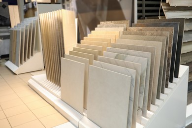 Assortment of tiles in store. Many different samples indoors