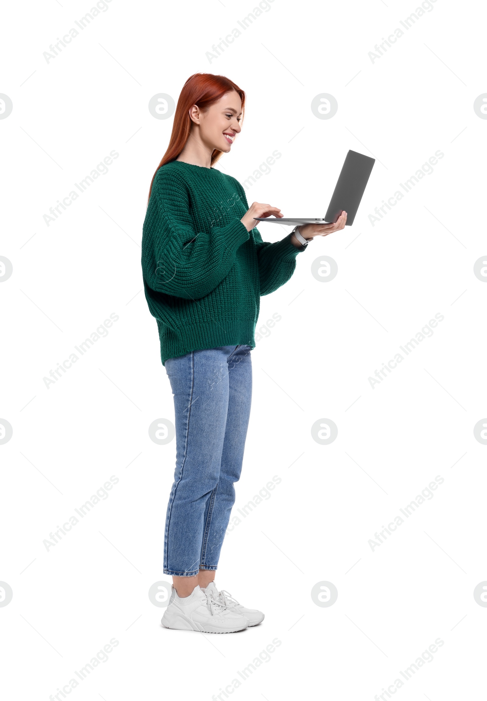 Photo of Happy woman using laptop on white background