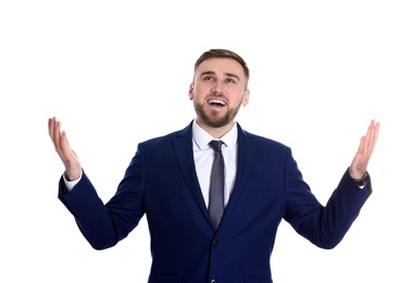 Photo of Young businessman under rain of money on white background