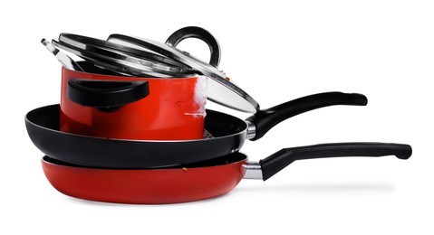 Stack of dirty kitchenware on white background