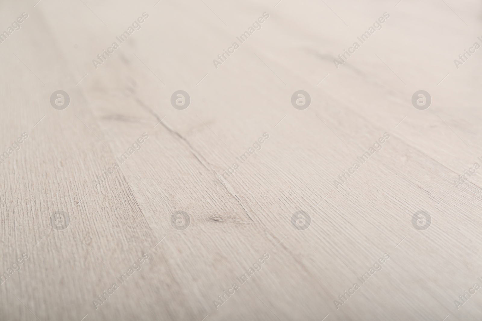 Photo of Light wooden laminate as background. Floor covering