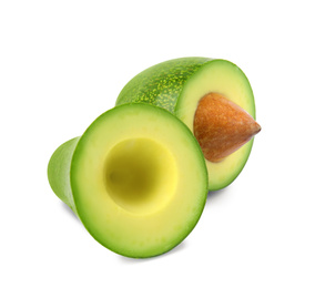 Photo of Cut tasty ripe avocado on white background. Tropical fruit