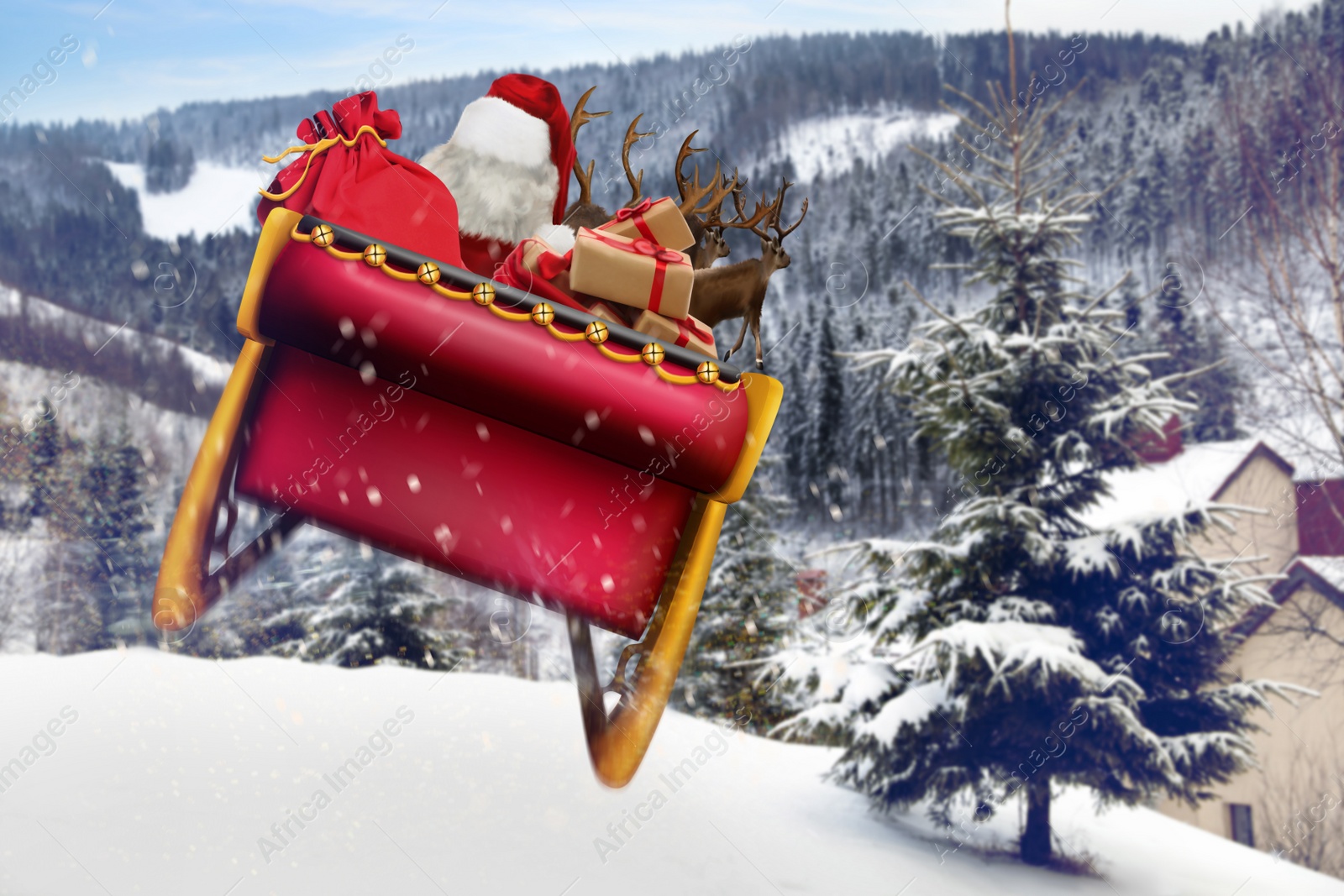 Image of Magic Christmas eve. Santa with reindeers outdoors on snowy winter day 