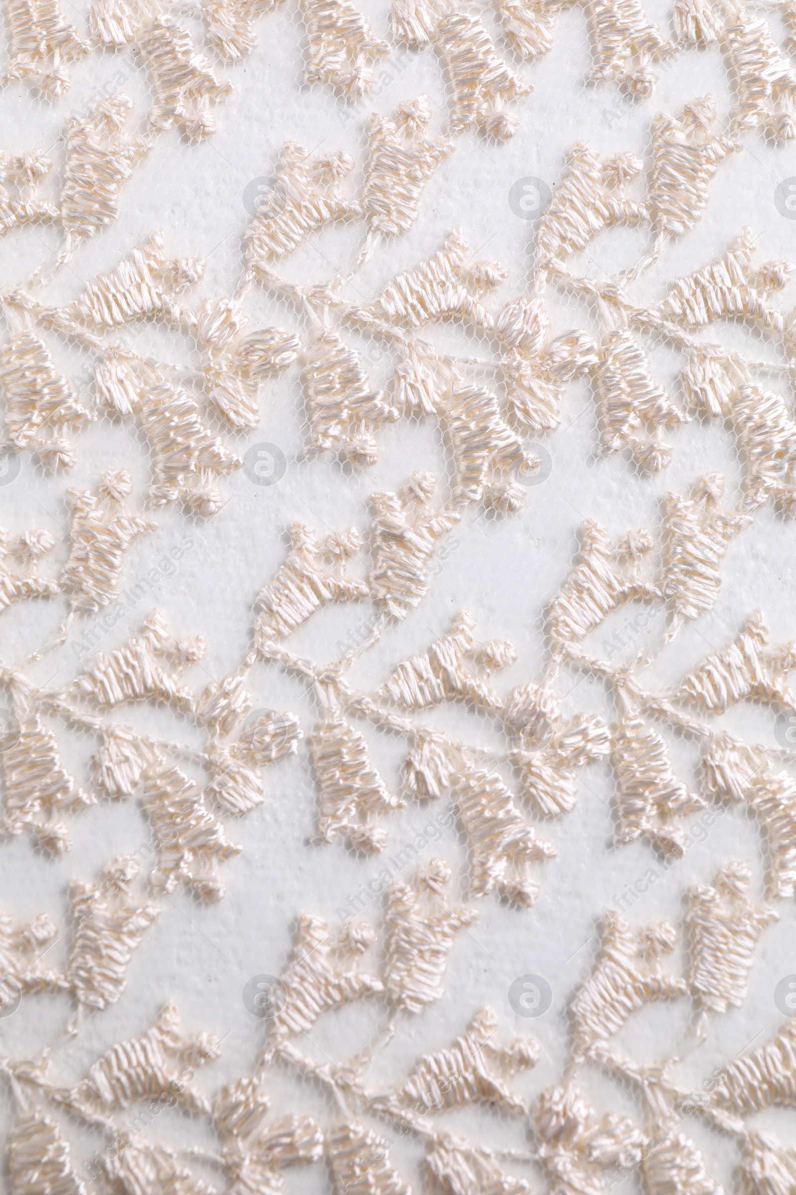 Photo of Beautiful beige lace as background, top view