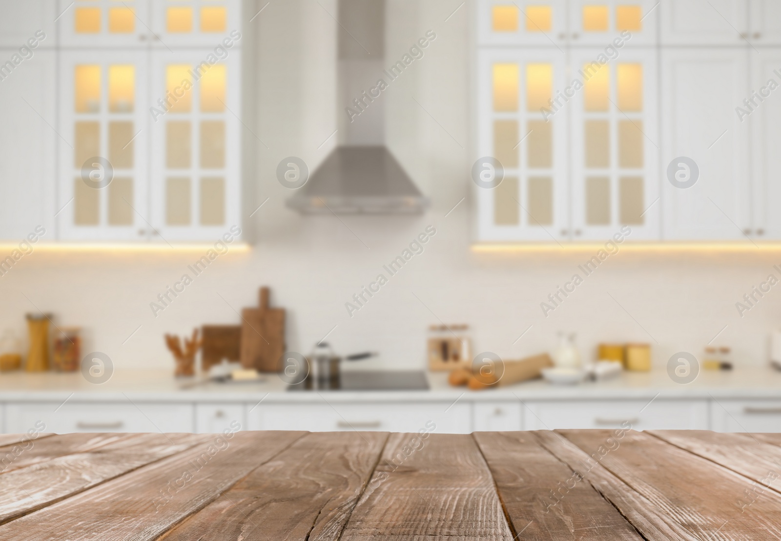 Image of Empty wooden table and blurred view of stylish kitchen interior. Mockup for design