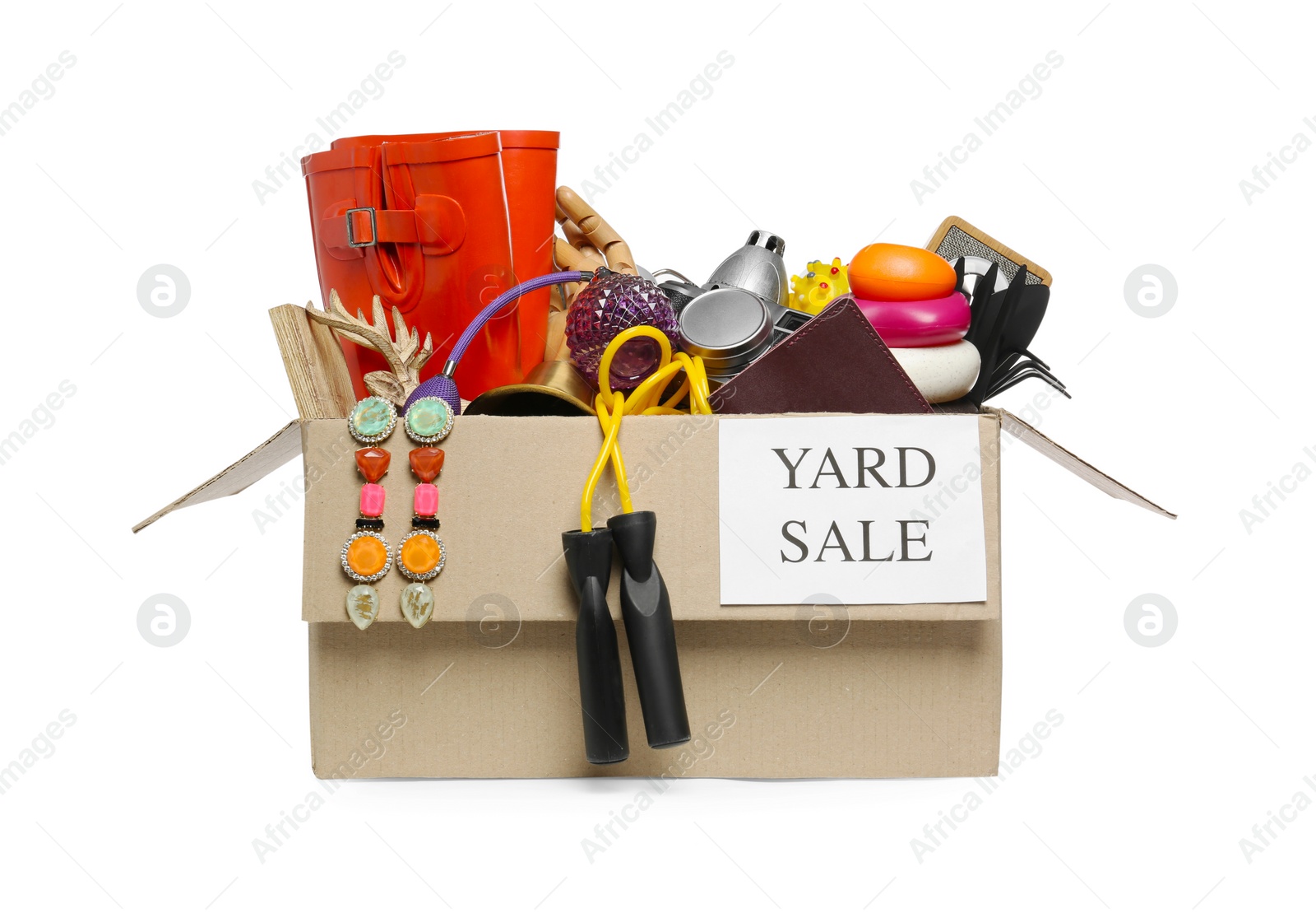 Photo of Sign Yard Sale written on box with different stuff isolated on white